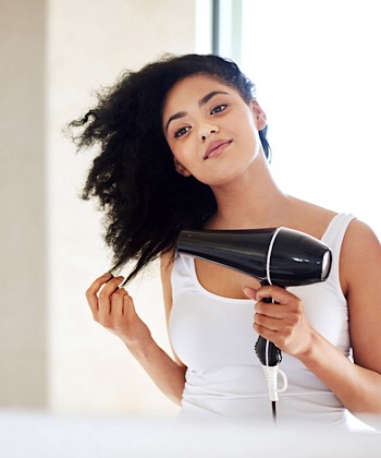 If You MUST Use a Dryer, Here's How to Protect Your Natural Hair